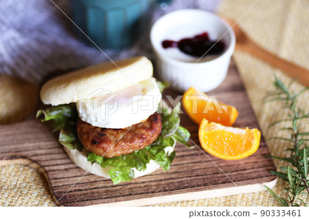 Lunch of sausage egg muffins and yogurt 90333461