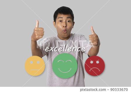 Young man showing approving doing positive gesture with happy Smiley face icon to give satisfaction in service. Young man showing approving doing positive gesture with happy Smiley face icon to give satisfaction in service. 90333670