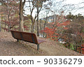 Late autumn mountain bench 90336279