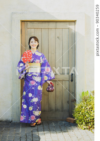 A woman in a yukata A woman in a yukata 90340259