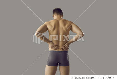 Unwell man suffer from lower back spasm Unwell man suffer from lower back spasm 90340608