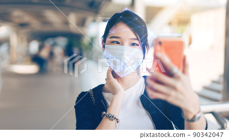 Selfie young adult business asian working woman wear face mask for protect virus corona or covid19. 90342047