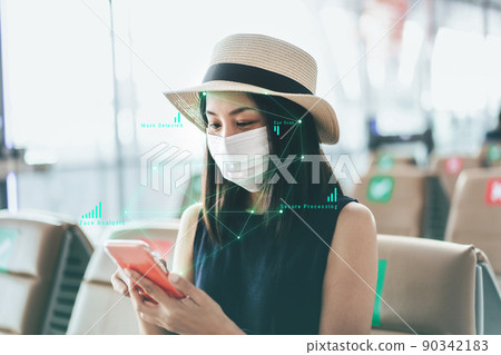 Identity scan young adult asian travel woman wear face and mask at airport terminal 90342183