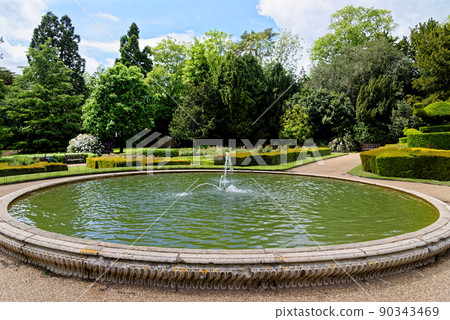 Garden and Fountain inside of the Warwick Castle - England 90343469