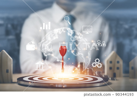 Targeting the business concept, Businessman hand holding red dart to the virtual target dartboard, Executive marketing, investment goal and target for business investment concept, 90344193