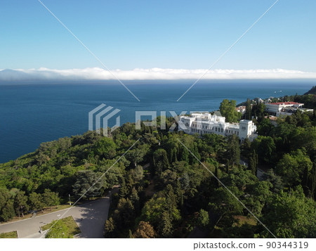 Aerial View of Livadia Palace - located on the shores of the Black Sea in the village of Livadia in the Yalta region of Crimea. Livadia Palace was a summer retreat of the last Russian tsar Nicholas II 90344319