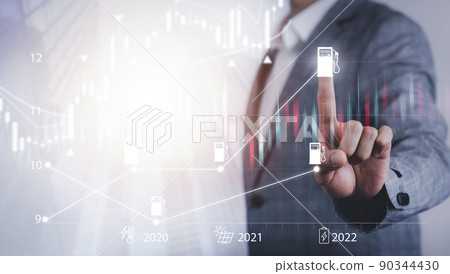 Oil energy graph of the world market, impact on the economy concept, Businessman touch chart with the indicator on the oil price slide at gas station, fluctuations in oil prices and exchange trade. Oil energy graph of the world market, impact on the economy concept, Businessman touch chart with the indicator on the oil price slide at gas station, fluctuations in oil prices and exchange trade. 90344430