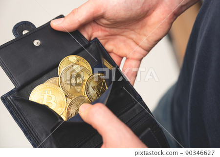 Cryptocurrency coins in wallet, Bitcoin, Ethereum 90346627