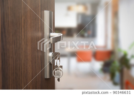 Keys in the door keyhole. New flat concept 90346631