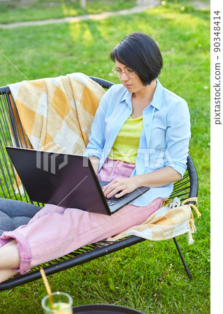 Female typing on the laptop for remote working, Freelancer woman Female typing on the laptop for remote working, Freelancer woman 90348414