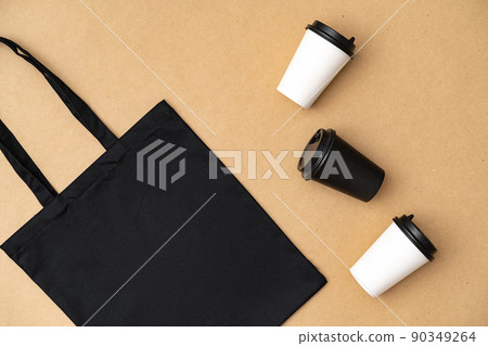 Textile shopping bag and coffee cup flat lay Textile shopping bag and coffee cup flat lay 90349264
