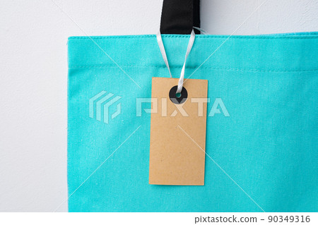 Eco bag for shopping with blank tag on white background Eco bag for shopping with blank tag on white background 90349316