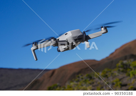 Drone protection flying during the day in volcano mountains Drone protection flying during the day in volcano mountains 90350188