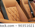Part of brown leather luxury car seat 90351021