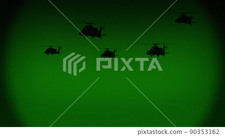 Apache AH-64 helicopters fly at night, night vision infrared 90353162