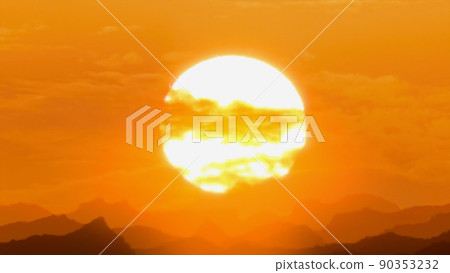 Red orange sunset over the mountains, hot weather, heat distortion 90353232