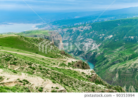 view from the observation deck for tourists to the Sulak canyon and the reservoir of the Chirkey hydroelectric power station in the Caucasus mountains view from the observation deck for tourists to the Sulak canyon and the reservoir of the Chirkey hydroelectric power station in the Caucasus mountains 90353994