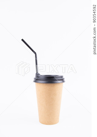paper cup for coffee with a lid and a straw on a white background paper cup for coffee with a lid and a straw on a white background 90354592