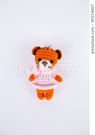 knitted bear toy on a white background 90354607