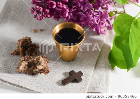 The Feast of Corpus Christi Concept. Bread and red wine symbols of Jesus Christ blood and body. The Feast of Corpus Christi Concept. Bread and red wine symbols of Jesus Christ blood and body. 90355466