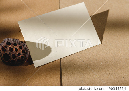 Foliage shadow on paper background with business card Foliage shadow on paper background with business card 90355514