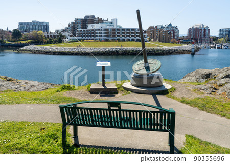 Victoria, BC, Canada - April 14 2021 : Victoria Inner Harbour beautiful scenery. Songhees Point Park. Victoria, BC, Canada - April 14 2021 : Victoria Inner Harbour beautiful scenery. Songhees Point Park. 90355696