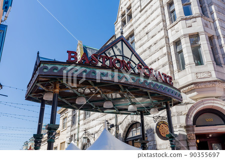 Victoria, BC, Canada - April 14 2021 : Entrance of the Bastion Square. A historic pedestrian mall in Victoria, British Columbia. 90355697