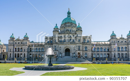 Victoria, BC, Canada - April 14 2021 : British Columbia Parliament Buildings. Legislative Assembly Fountain. 90355707