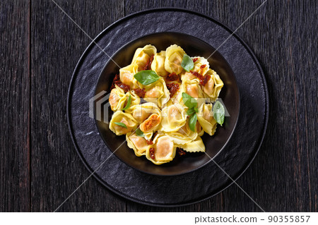 italian Tortelloni stuffed with sun dried tomatoes italian Tortelloni stuffed with sun dried tomatoes 90355857