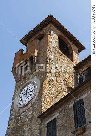 Old clock tower in Passignano sul Trasimeno ,Italy 90356745