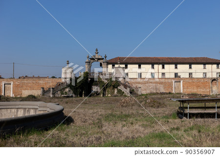 facade of an ancient castle with large windows in italy facade of an ancient castle with large windows in italy 90356907