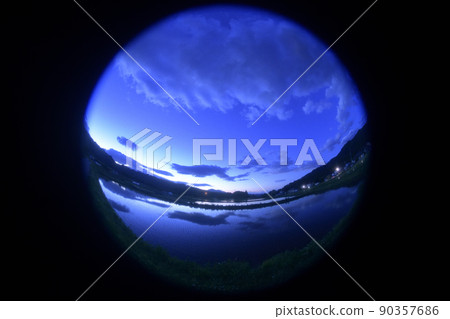 Jupiter and Mars rising side by side in the white sky before sunrise in Hakushu-cho, Hokuto City 90357686