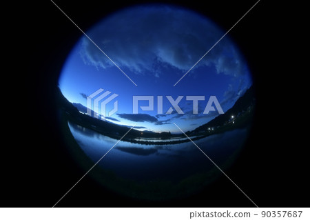 Jupiter and Mars rising side by side in the white sky before sunrise in Hakushu-cho, Hokuto City 90357687