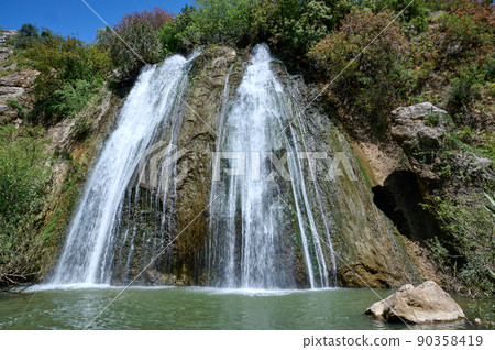 Waterfall landscape. Ayun's fall water stream. River Nahal Ayun . Nature Reserve and National park. Upper Galilee, Israel 90358419