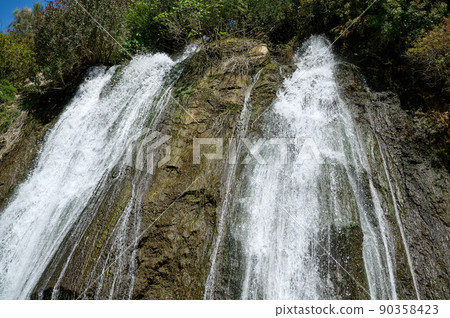 Waterfall landscape. Ayun's fall water stream. River Nahal Ayun . Nature Reserve and National park. Upper Galilee, Israel 90358423