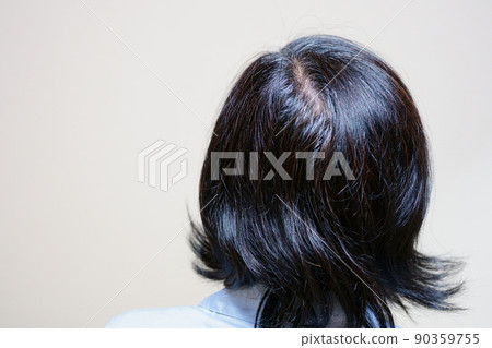 The swell of the back of the head of a middle-aged woman The swell of the back of the head of a middle-aged woman 90359755