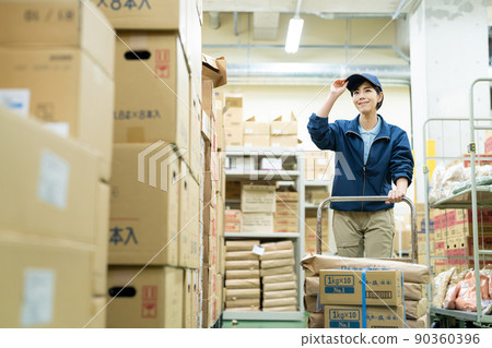 Female warehouse driver Female warehouse driver 90360396