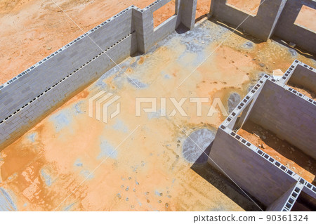 Aerial view of unfinished blocks concrete foundation for new houses Aerial view of unfinished blocks concrete foundation for new houses 90361324