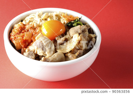 Bibimbap bowl with lots of ingredients such as bean sprout namul, kimchi, and pork Bibimbap bowl with lots of ingredients such as bean sprout namul, kimchi, and pork 90363856