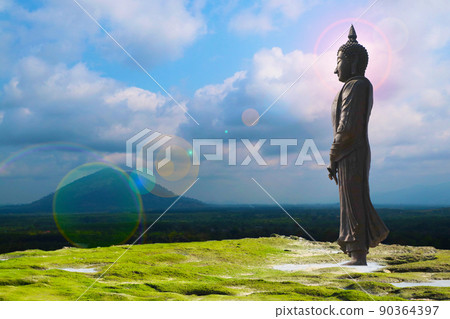 Buddha looking seven day style and sun back status mountain hill background Buddha looking seven day style and sun back status mountain hill background 90364397