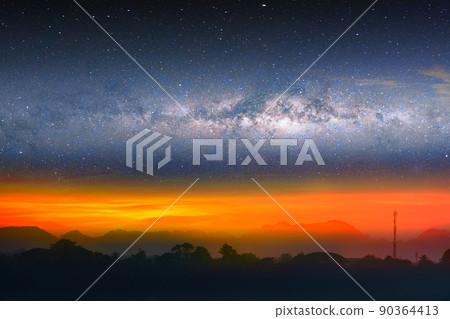 Milky way night landscape colorful sunset light over silhouette mountain Milky way night landscape colorful sunset light over silhouette mountain 90364413