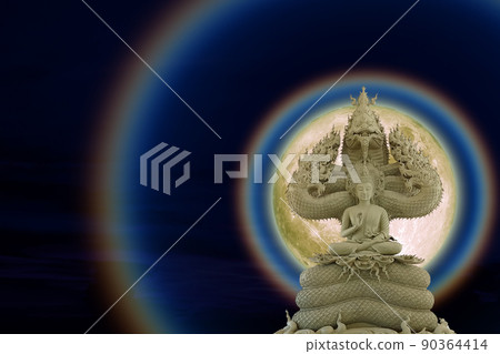 Moon corona light and Buddha protected by the hood of the mythical naga on the night sky Moon corona light and Buddha protected by the hood of the mythical naga on the night sky 90364414