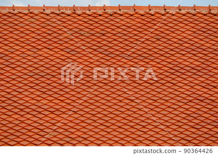 Roof tile on top sky background Roof tile on top sky background 90364426