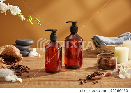 A closeup view of coffee bean and powder decorated with wooden tray candles and flower with blank space for exfoliating advertising , mixture of coffee and salt A closeup view of coffee bean and powder decorated with wooden tray candles and flower with blank space for exfoliating advertising , mixture of coffee and salt 90366480