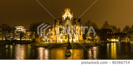 St. John's Church at night surrounded by a pond in Stuttgart, Germany 90366754