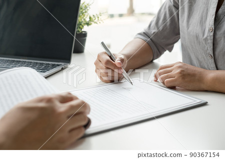 Business people hold a resume and talk to job applicants for job interviews about careers and Their personal history in the company. Recruitment concepts Business people hold a resume and talk to job applicants for job interviews about careers and Their personal history in the company. Recruitment concepts 90367154
