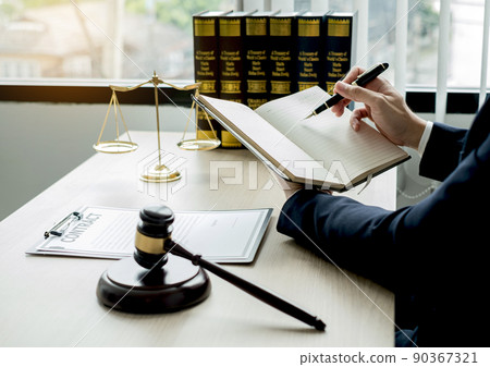 Professional man lawyers work at a law office There are scales, Scales of justice, judges gavel, and litigation documents. Concepts of law and justice 90367321