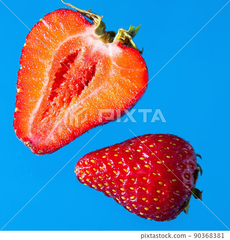 Ripe strawberries on a solid background, healthy vegetarian food. Beautiful Ripe strawberries on a solid background, healthy vegetarian food. Beautiful 90368381