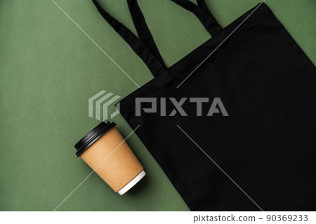 Textile shopping bag and coffee cup flat lay Textile shopping bag and coffee cup flat lay 90369233
