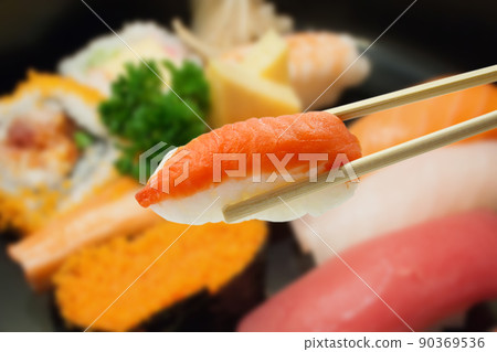 sushi with chopsticks 90369536
